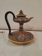 antica lampada a olio in