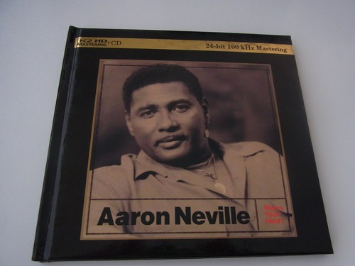 Aaron neville warm your - neville,