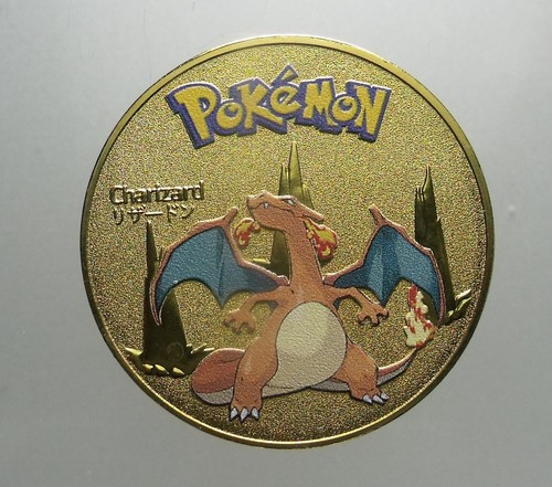 Medaglia pokémon charizard - medaglia,