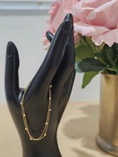 Bracciale in oro 18 kt con 9