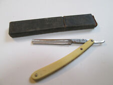 Antico rasoio con custodia