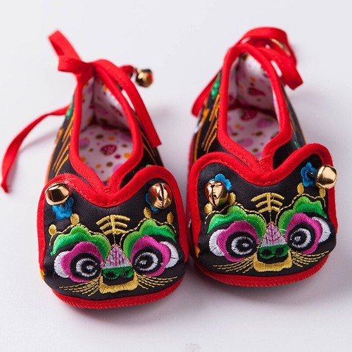 Scarpe testa tigre - di,