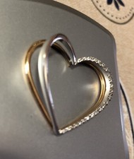 Ciondolo cuore in oro giallo e bianco  18 kt con zirconi