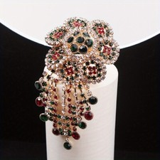 Spille con fiori traforati