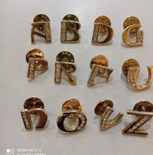 SPILLA   INIZIALE   da giacca