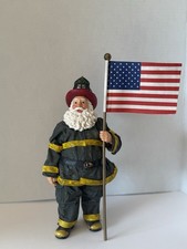 Statuina Babbo Natale Pompiere