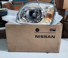 FRONT LEFT HEADLIGHT NISSAN