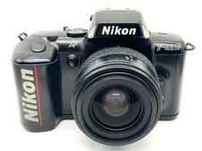 Nikon F-401x + Tokina 35-70mm