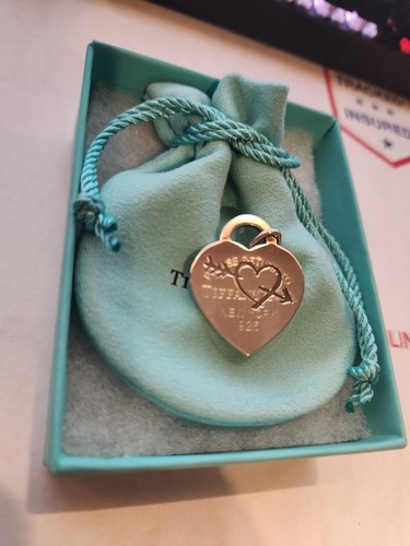 Please return tiffany co - tiffany, &
