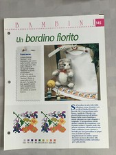 Schema punto croce Bambini Un bordino fiorito abito vestito bavaglino fiori