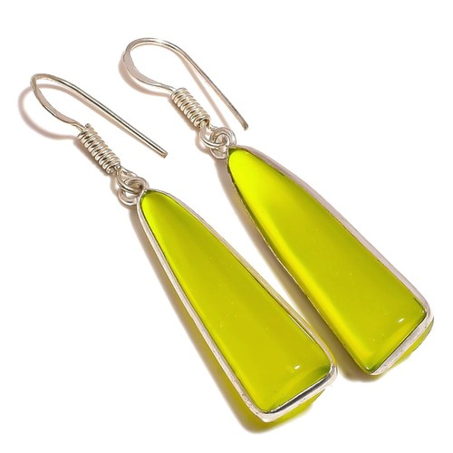Orecchini pendenti fatti - , a