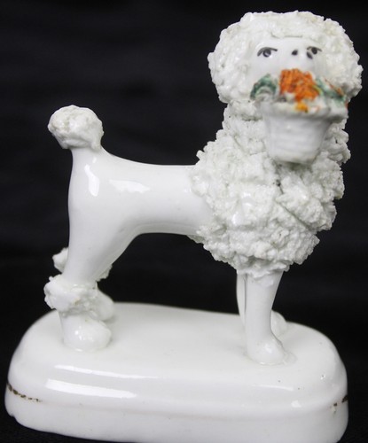 Piccola statuina barboncino