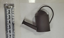 mini watering can for
