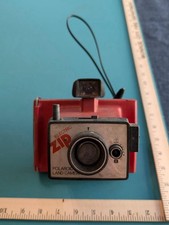 Electric Zip Polaroid Land
