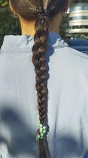vendo capelli castano chiaro, mai tinti, treccia da 23 cm non ancora tagliata