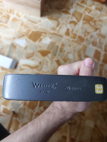 Una mazza golf - una,