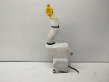 Bottiglia e motore lavatrice