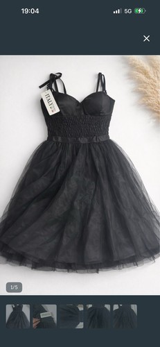 Vestito nero con - , in