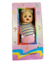 BAMBOLA MUSICALE CHE CAMMINA