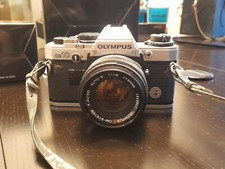 olympus OM 10 con scatola e istruzioni. Obiettivo 50 mm F Zuiko Auto- S F 1.8
