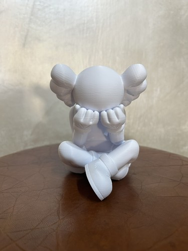 Action figure separated kaws