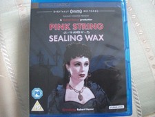 PINK STRING AND SEALED WAX BLU