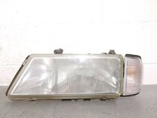 8411 Faro fanale proiettore ant sx con freccia Lancia Dedra dal 1994 al 1997 cod