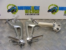 Pilotone gancio poggiapiedi