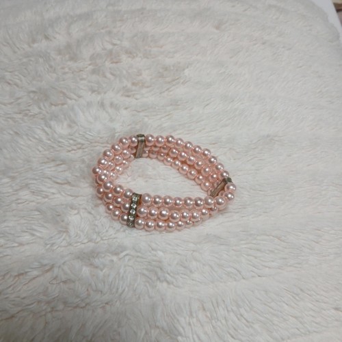 Bracciale elastico con - , perle