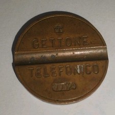 Gettone telefonico 7712 CMM con errore di conio usatto in buoni condizioni 