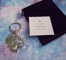 Portachiavi e sacchetto regalo