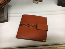 portafoglio in pelle e pitone