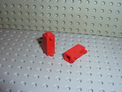 Lego red brick 1x1x2 with - x,