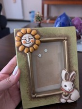 cornice Thun verde con sole e