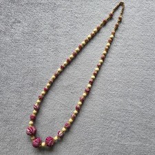 Collana di perle in tessuto