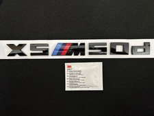 BMW X5 M50d DISTINTIVO IN NERO