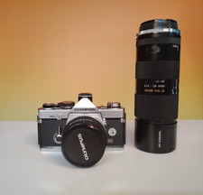 Camera Olympus OM-2n.Ottica Zuiko 50mm 1: 1,8. Ottica tambron 70-210