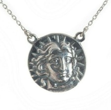 Antica moneta greca dio sole