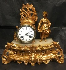 Pendule en régule redorée