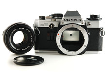 Macchina fotografica analogica Olympus OM10+ obiettivo 50mm Zuiko auto -s. f/1,8