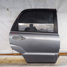 770041F020 Porta post. DX KIA