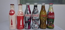 4 Bottiglie Coca Cola + 2