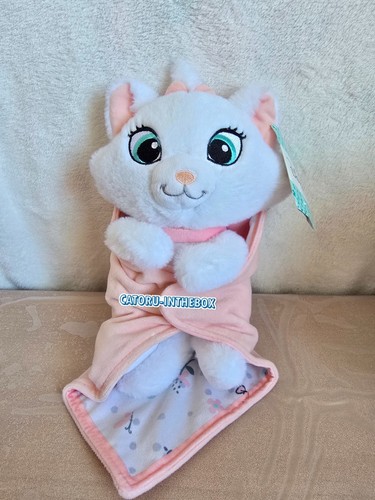 Doudou peluche avec couverture
