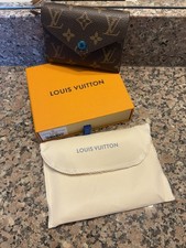 Portafoglio e porta carte LV