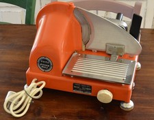 VECCHIA AFFETTATRICE QUICK MILL ARANCIONE   [TI44]