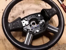 VOLANTE CON COMANDI CAMBIO PER