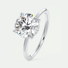 Anello in oro bianco 18 kt con semi montatura tondo diamante massiccio 0,20 c...