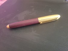 Louis Vuitton penna roller Doc Cuir pelle marrone 