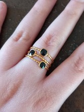 Anello a fascia in acciaio placcato oro e nero