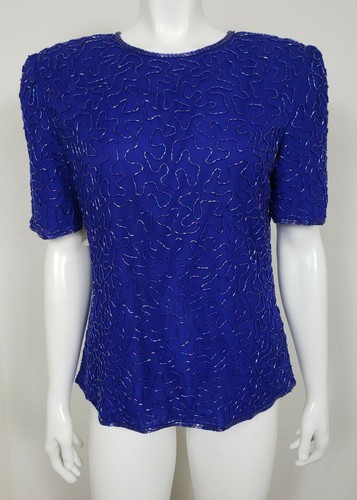 Top donna laurence kazar - donna,